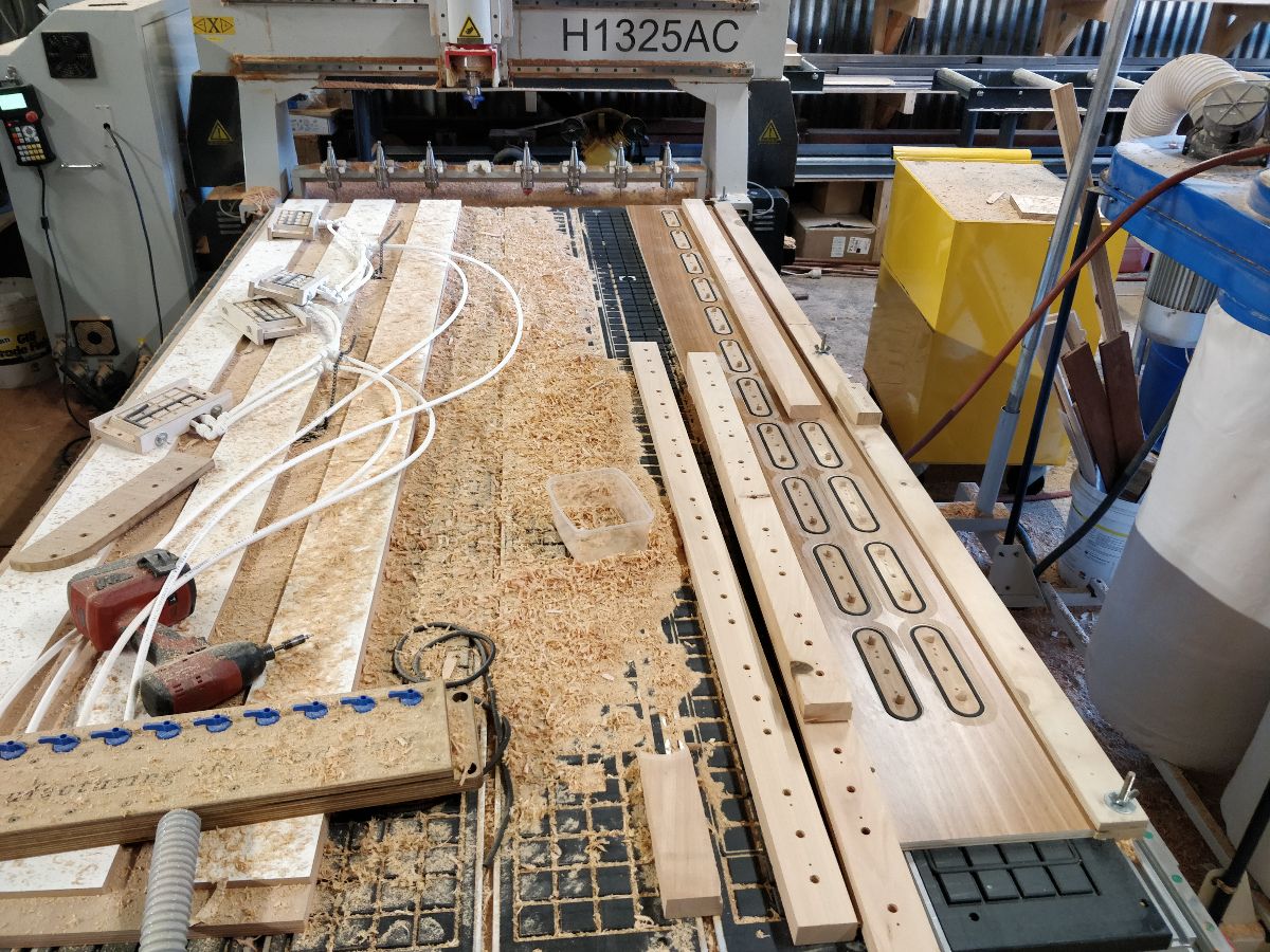 Vacuum work holding for machining the dowels
