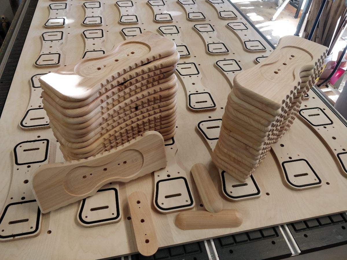Raised vacuum work holding to allow edge undercut